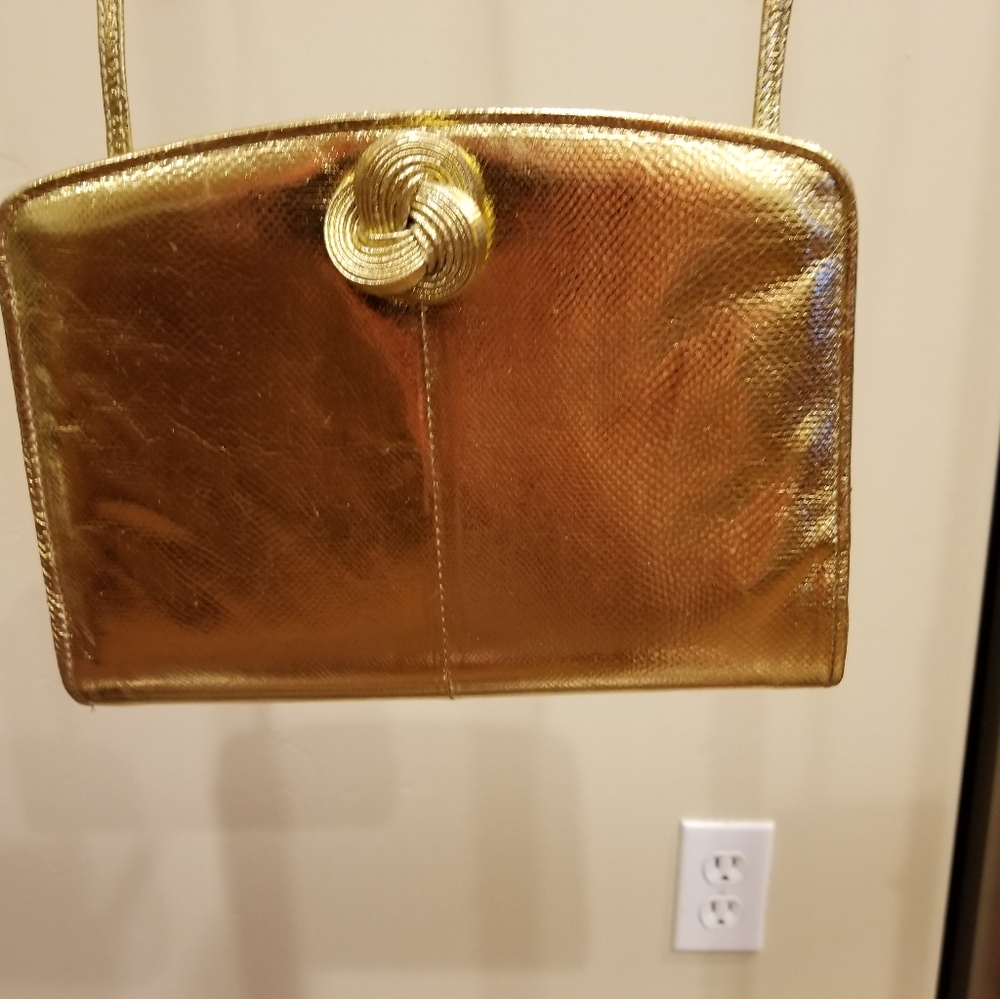 Luxurious Gold Clutch with Elegant Knot Detail